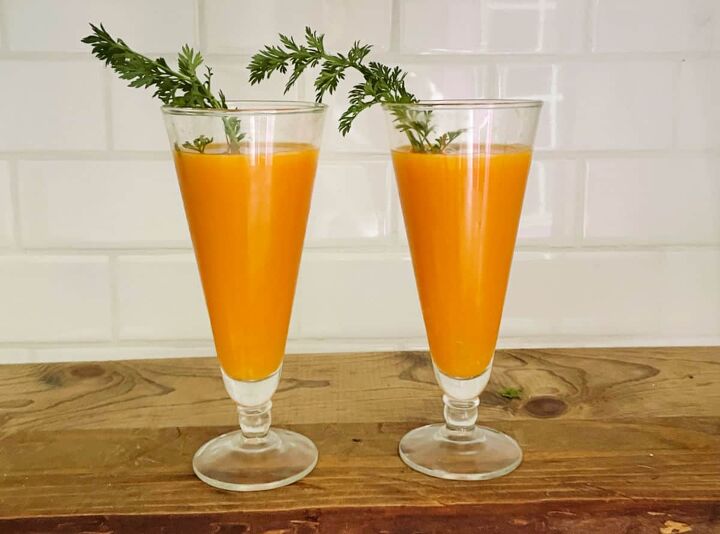 carrot mimosa, Carrot mimosa on a wood table in front of a white subway tile background