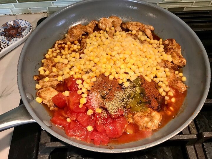 mexican marinated chicken and rice skillet, Skillet with Mexican Marinated Chicken tomatoes green chiles corn and seasonings