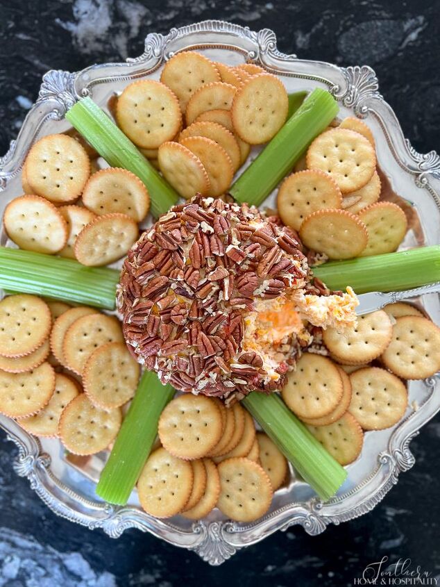 southern pimento cheese ball easy masters party favorite, Pimento cheese ball on silver tray with crackers and celery