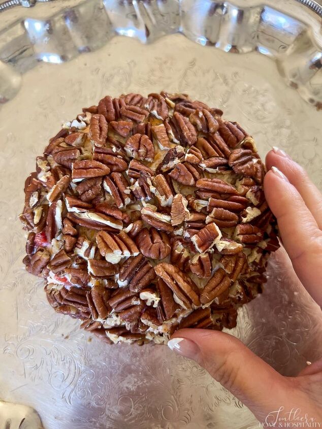 southern pimento cheese ball easy masters party favorite, Pressing pecans onto cheese ball