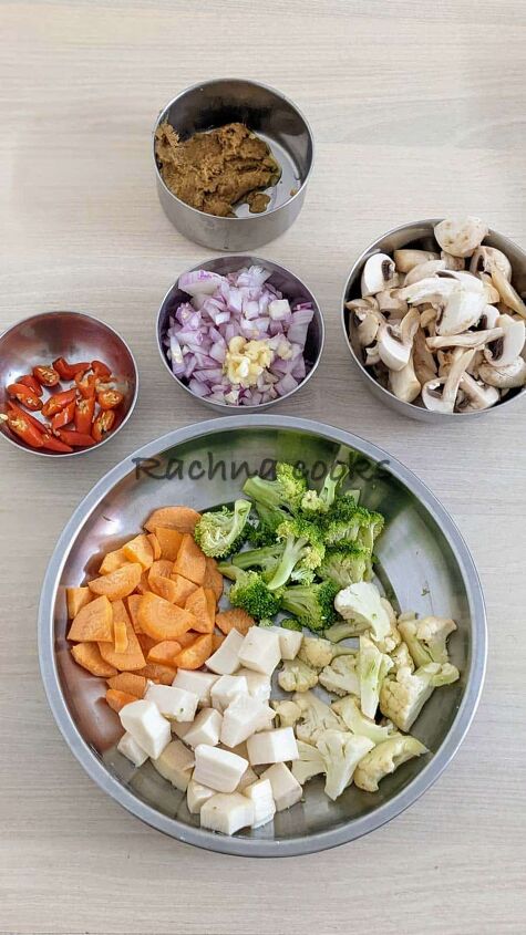 vegetarian tom kha soup, Bowls of chopped vegetables mushrooms onion garlic red chillies and tom kha paste
