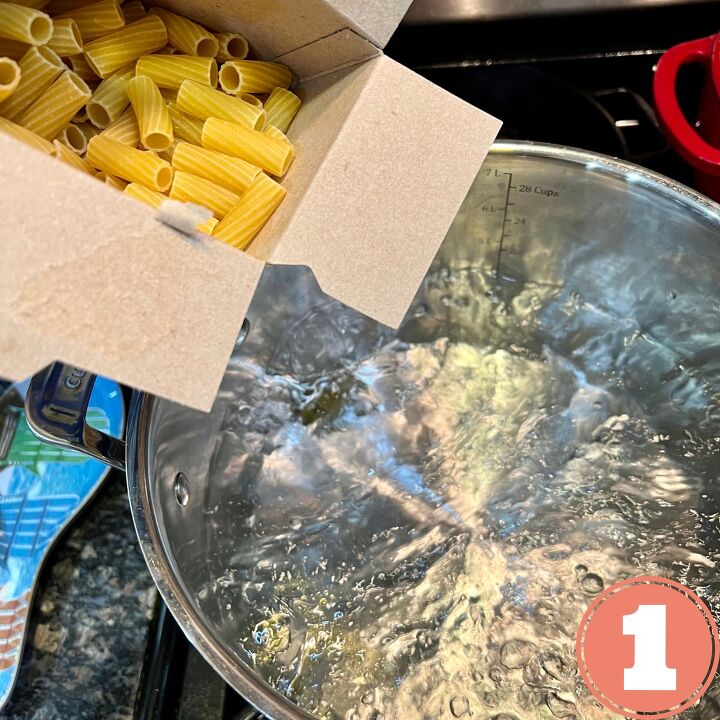 ww meatless baked ziti, A box of pasta being poured into a pot of boiling water