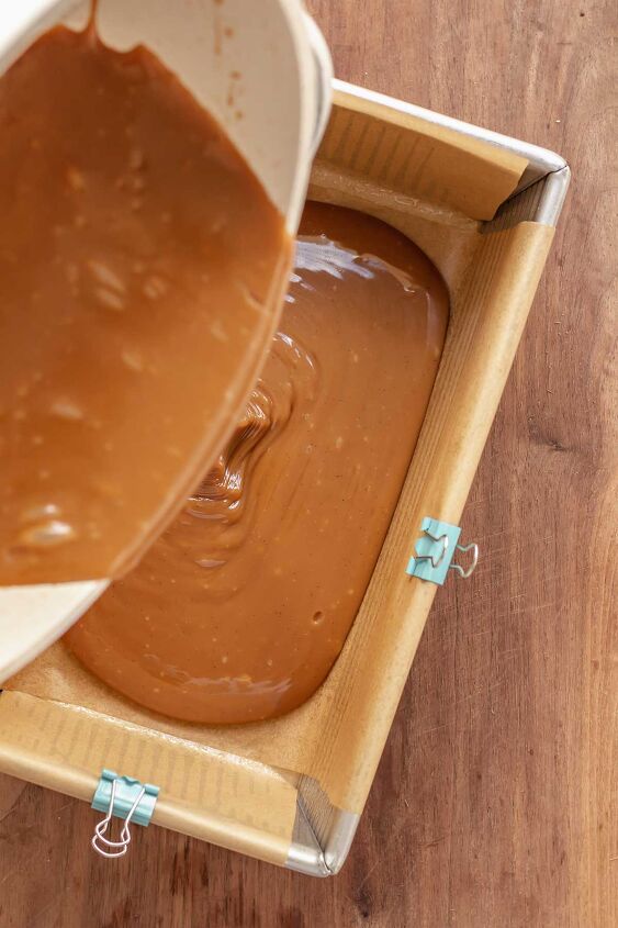 salted bourbon caramels, Caramel being poured into a prepared loaf pan