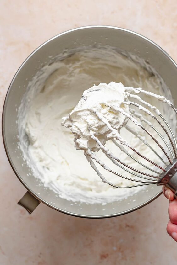 raspberry and almond cake, Whipped cream on a whisk