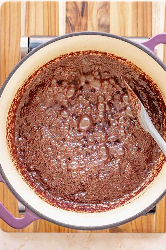 chocolate rice krispie treats, Chocolate mixture bubbling in a pot
