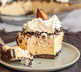 oreo peanut butter pie, A slice of peanut butter oreo pie on a plate with a bite sitting on a fork