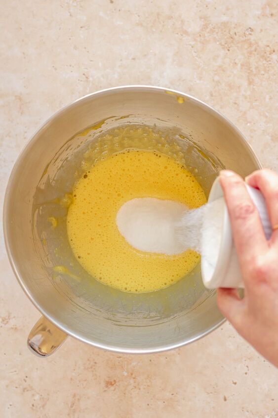 daffodil cake, Sugar being poured into beaten egg yolks