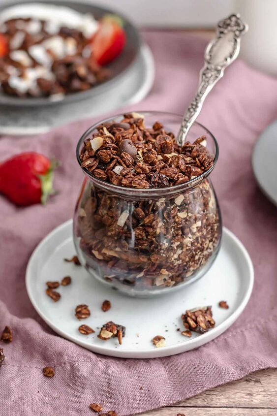 dark chocolate granola, Chocolate granola in a cup with a spoon in it