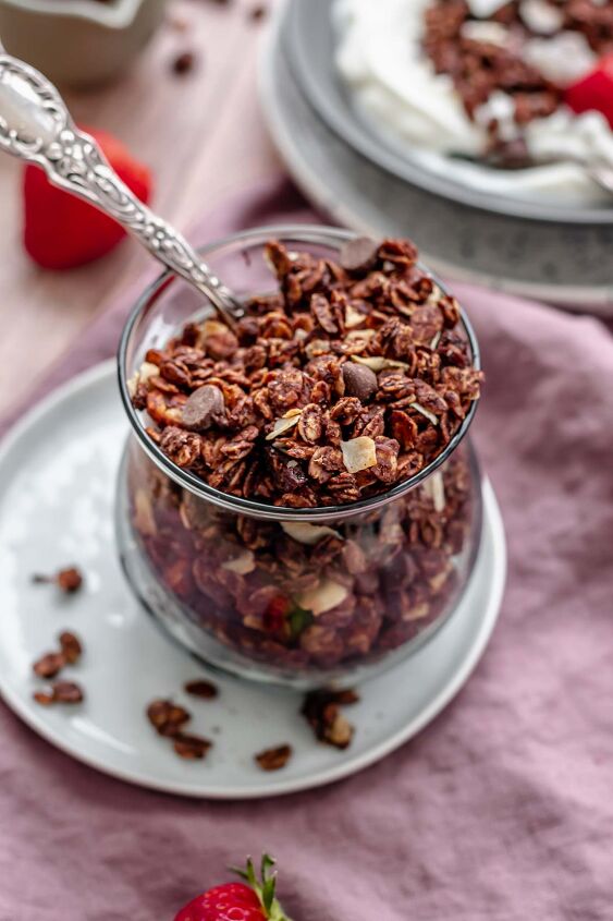 dark chocolate granola, Chocolate granola in a cup with a spoon in it