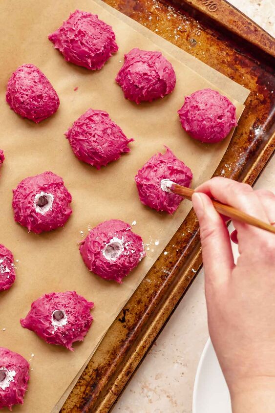 chocolate raspberry truffles with raspberry filling, A chopstick inserts into each ganache ball to create an opening