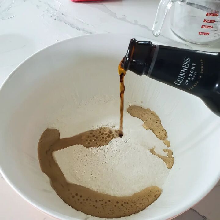 simple guinness beer bread, Adding Guinness to flour for beer bread