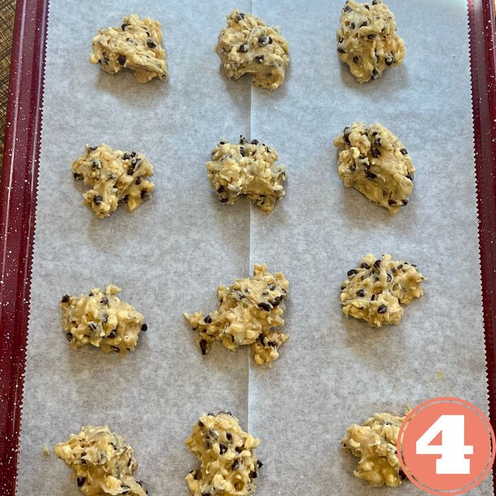 ww popcorn chocolate chip cookies, Weight Watchers Popcorn Chocolate chip cookie dough dollops on a baking pan lined with parchment paper