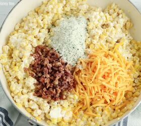 crack corn casserole, Cream cheese corn with shredded cheese crumbled bacon and ranch seasoning on top before being stirred together