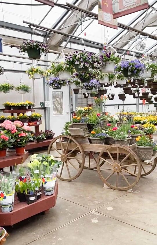 the best menu ideas for easter sunday brunch, my local nursery with tables and a wooden cart filled with pots of flowers This answers the question of what do moms really want for mother s day