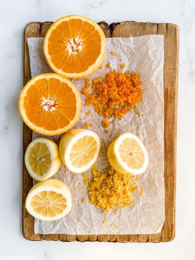 make this daffodil cake recipe for spring, orange and lemon halves on a wooden board