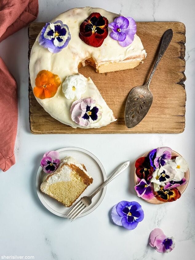 make this daffodil cake recipe for spring, daffodil cake on a wooden board next to a slice of cake on a ceramic plate