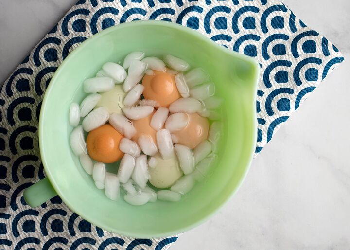 simple deviled eggs, Cooked eggs in ice water in a jadeite bowl