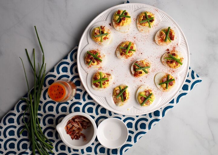 simple deviled eggs, Simple Deviled Eggs garnished with paprika bacon crumbles and chives