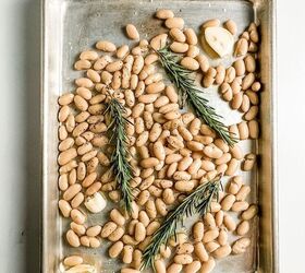 you want to make these crispy roasted white beans, white beans with rosemary and garlic on a sheet pan