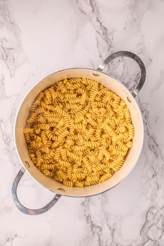 creamy one pot pasta with ricotta and lemon, Rotini pasta cooking in a large stockpot