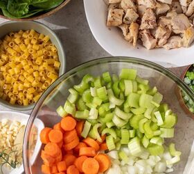 instant pot creamy chicken soup, Ingredients for instant pot creamy chicken soup A big bowl with chopped onions celery and carrot A bowl of fresh spinach a bowl of pasta and a bowl of cooked rotisserie chicken