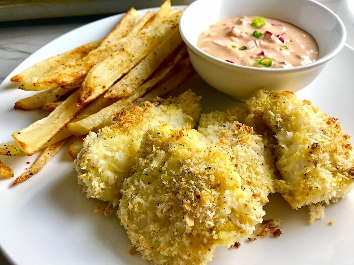 crispy baked cod panko fish and chips, Crispy Baked Cod Panko Fish and Chips on a plate with side of remoulade dipping sauce Everything bakes in the oven on a sheet pan to save time and energy