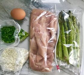 chicken asparagus breadcrumbs scallions and egg all in baggies on counter
