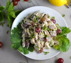 easy chicken salad with grapes, Lemon Basil Chicken Salad with Grapes on a plate on counter with grapes and lemon in background This recipe is simple but the taste is anything but simple It has layers of flavors and textures You get the hearty texture of the chicken brightness from the lemon the fresh and fragrant basil a slight bite from the onion and a huge juicy burst of sweetness from the grapes