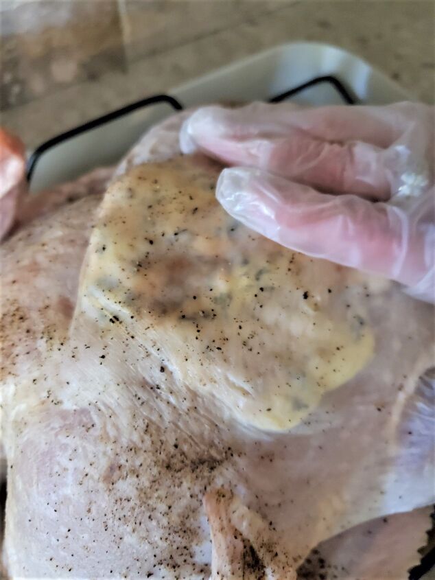 guaranteed easy juicy crispy roast turkey recipe, flattening sage butter under turkey breast skin