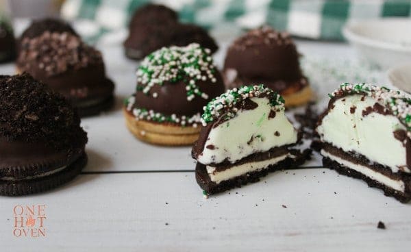 chocolate covered ice cream bites with oreos, Oreo ice cream cookie bites with one cut in half