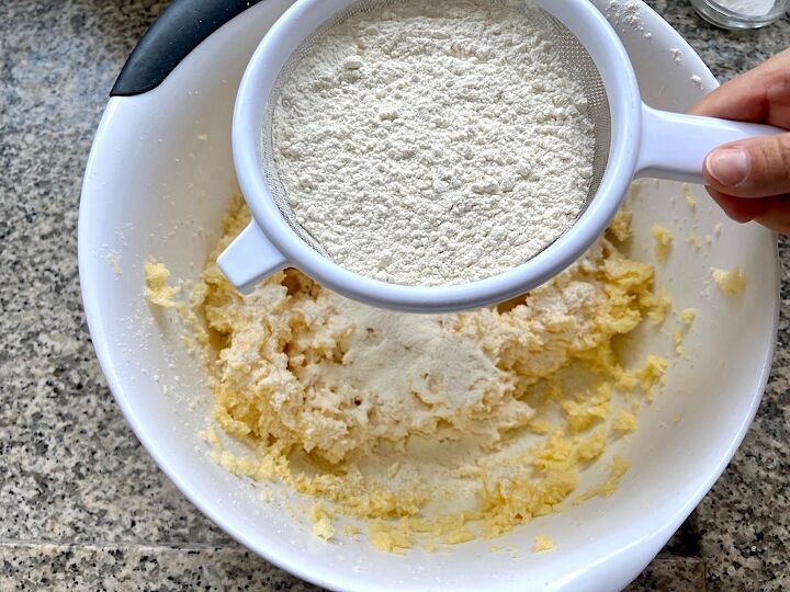 best brazilian cake bolo de brigadeiro, Flour being sifted into butter and sugar mixture for Brigadeiro Brazilian Cake