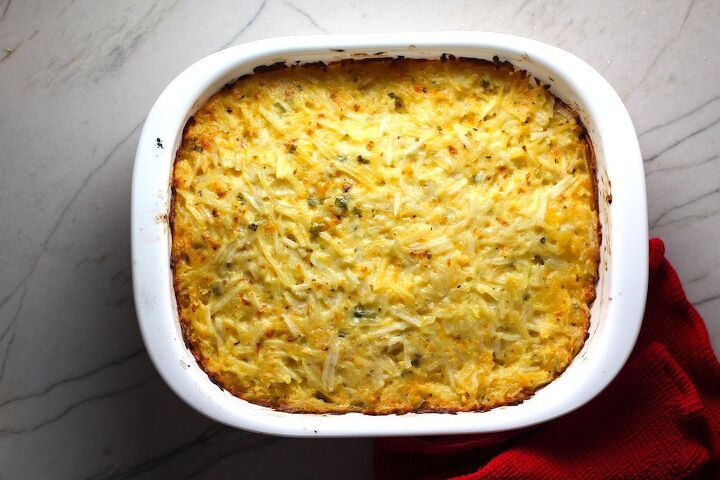 cheesy hash brown casserole without soup, Cheesy Hash Brown Casserole Recipe cooked in casserole dish on counter This recipe does not disappoint It s warm creamy and full of flavor And it s the perfect side dish for your holiday dinner