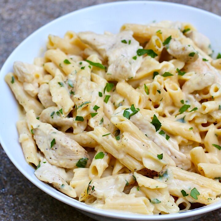 white sauce chicken pasta recipe, White Sauce Chicken Pasta Recipe on a plate with parsley garnish