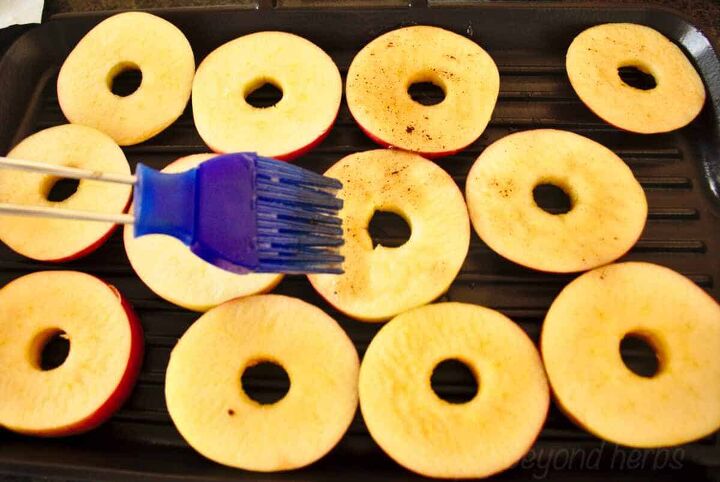 easy grilled apples with cinnamon and honey, brushing apple slices