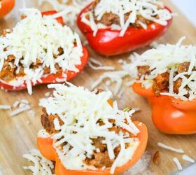 an easy lasagna inspired meat and cheese stuffed peppers keto recipe, mozarella on Lasagna Inspired Meat and Cheese Stuffed Peppers before baking