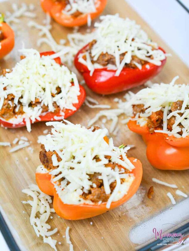 an easy lasagna inspired meat and cheese stuffed peppers keto recipe, mozarella on Lasagna Inspired Meat and Cheese Stuffed Peppers before baking