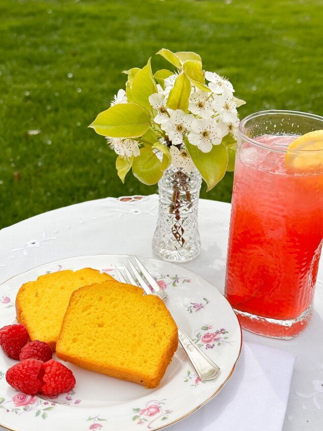 the recipe for raspberry cordial from anne of green gables, a table with raspberry cordial lemonade with lemon cake