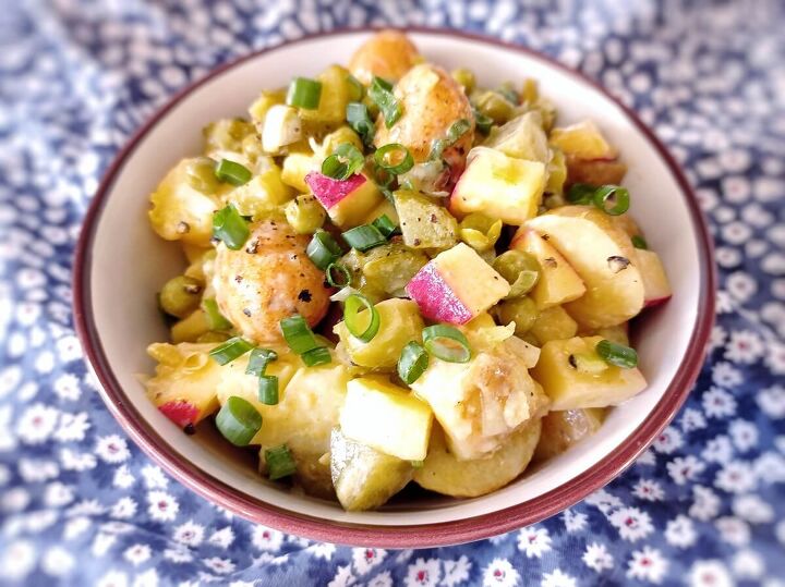 vegan potato salad, Vegan potato salad in a white bowl on a colorful tablecloth