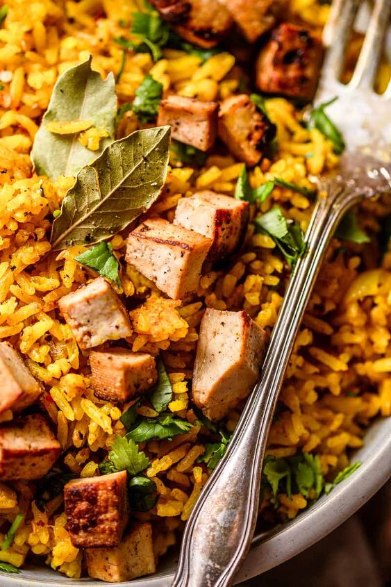 the easy yellow rice with baked tofu on top