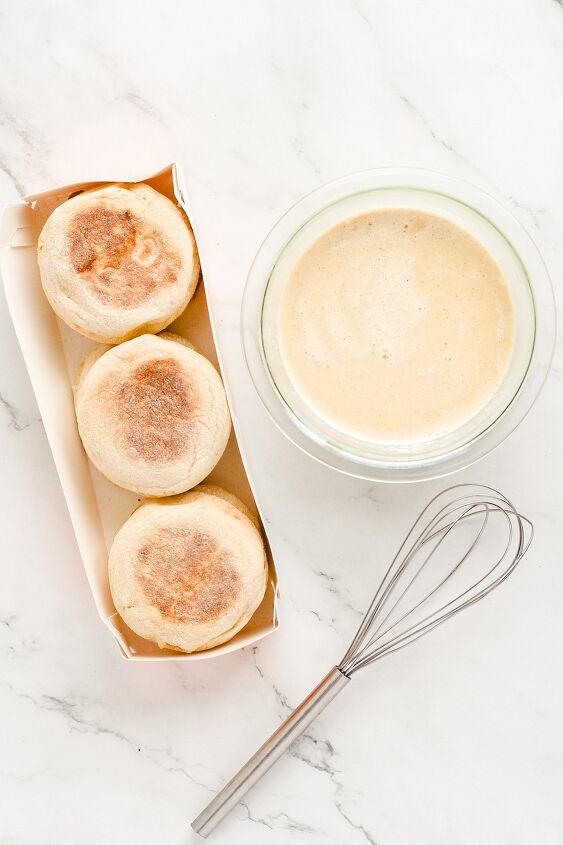 english muffin french toast, Pack of English muffins alongside bowl of custard and a wire whisk