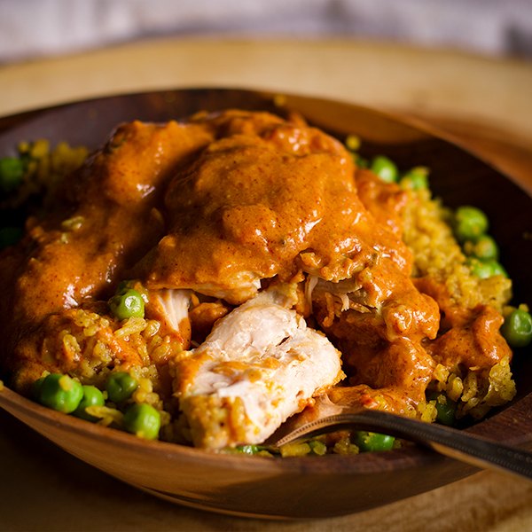 A bowl of Homemade Indian Butter Chicken with Indian Rice