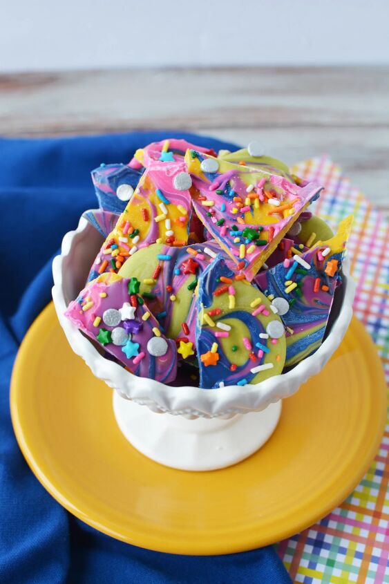 easy diy rainbow bark candy recipe, White bowl full of rainbow candy bark with sprinkles