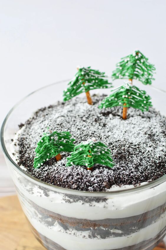 chocolate winter trifle with edible evergreen trees, Chocolate trifle with a winter wonderland topping of edible trees and powdered sugar snow