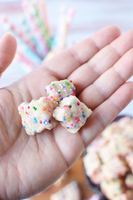 adorable fairy shortbread bites 100 mini cookies, Holding fairy shortbread bites with rainbow sprinkles