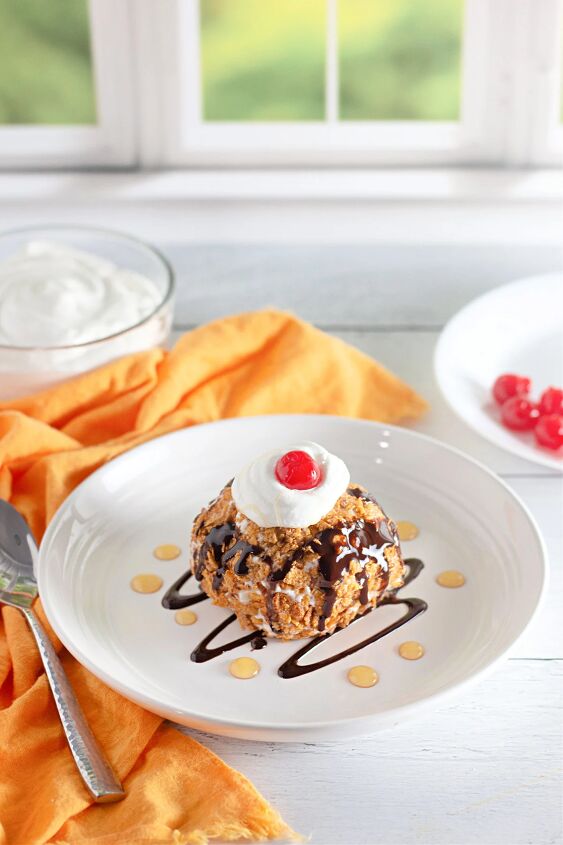 how to make crispy homemade fried ice cream, Fired ice cream with chocolate syrup and a cherry