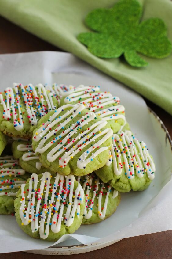 Pile of green cake mix cookies on a plate
