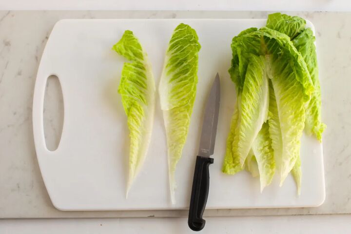 tasty low carb turkey club wrap recipe, Cutting romaine lettuce on a board