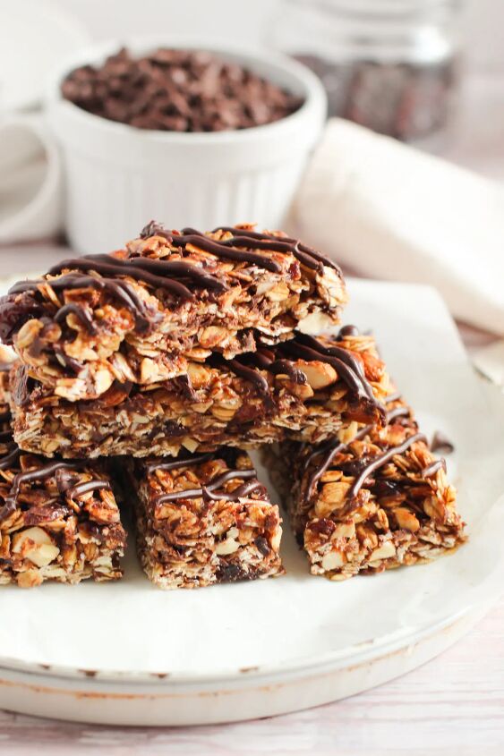 sweet and crunchy cherry chocolate granola bars recipe, Stacked granola bars with chocolate drizzle
