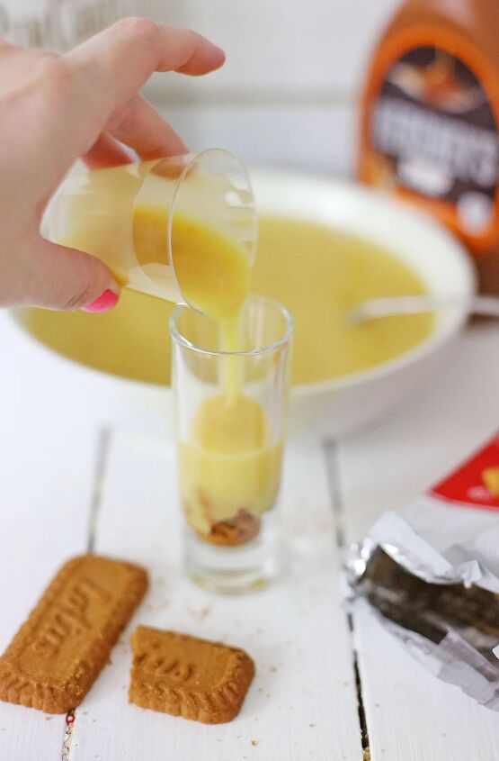 biscoff cookie rumchata pudding shots recipe, Pouring pudding over cookies in a shot glass