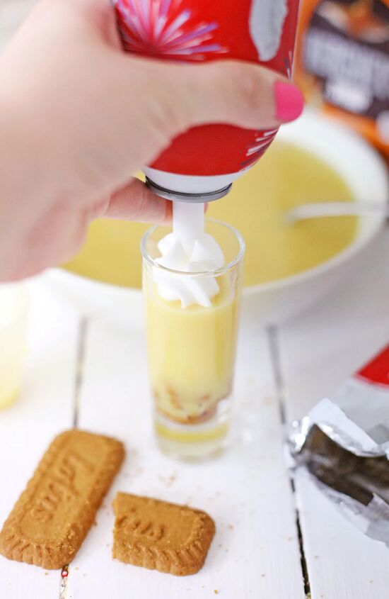 biscoff cookie rumchata pudding shots recipe, Adding whipped cream to pudding shots